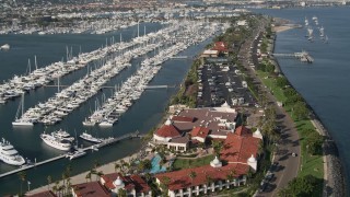 DCA08_174 - 4K aerial stock footage of an oceanfront hotel and marina on Shelter Island, California