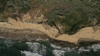 DCA08_224 - 4K aerial stock footage of a bird's eye view of coastal cliffs and satellite dish, Point Loma, California