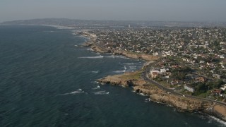 DCA08_226 - 4K aerial stock footage of coastal neighborhoods and cliffs, Point Loma, California