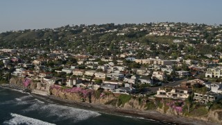 DCA08_239 - 4K aerial stock footage of upscale, oceanfront neighborhoods and cliffs, La Jolla, California