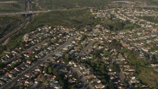 DCA08_265 - 4K aerial stock footage of railroad tracks and tract homes, University City, California