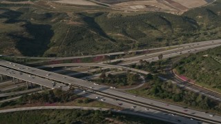 DCA08_266 - 4K aerial stock footage of light traffic on a freeway interchange, San Diego, California