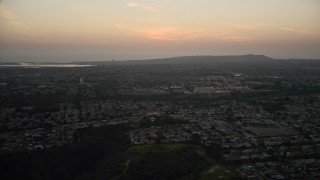 DCA08_336E - 4K aerial stock footage of suburban neighborhoods in Serra Mesa, California, twilight