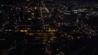 DCA08_343 - 4K aerial stock footage of skyscrapers, hotels and convention center at night in Downtown San Diego, California