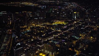 DCA08_345 - 4K aerial stock footage of city skyscrapers in Downtown San Diego, California, Night