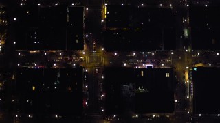 DCA08_353 - 4K aerial stock footage of a bird's eye view of city streets in Downtown San Diego, California, Night