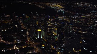 DCA08_360 - 4K aerial stock footage of tilting to skyscrapers from a wide view of Downtown San Diego, California, Night