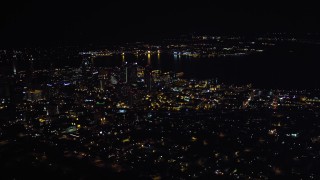 DCA08_370 - 4K aerial stock footage of a wide orbit of skyscrapers in Downtown San Diego, California, Night