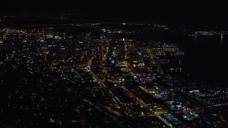DCA08_372 - 4K aerial stock footage of passing city skyscrapers in Downtown San Diego, California, Night
