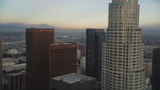 DCLA_027 - 5K aerial stock footage fly over and approach tower at sunset in Downtown Los Angeles, California