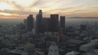 DCLA_030 - 5K aerial stock footage tilt from City Hall to reveal skyline at sunset in Downtown Los Angeles, California