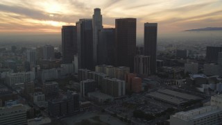 DCLA_036 - 5K aerial stock footage approach Downtown Los Angeles skyline from City Hall at sunset, California