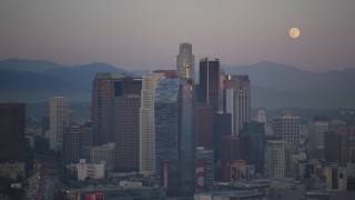 DCLA_063 - 5K aerial stock footage of full moon and Downtown Los Angeles skyscrapers at twilight, California