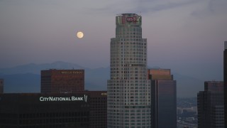 DCLA_072 - 5K aerial stock footage of full moon and US Bank Tower in Downtown Los Angeles at twilight, California