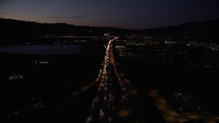 DCLA_090 - 5K stock footage aerial video fly over light traffic on Interstate 5 interchange in Sylmar at night, California