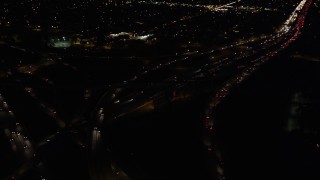 DCLA_097 - 5K aerial stock footage of I-5 and 118 interchange at night in San Fernando, California
