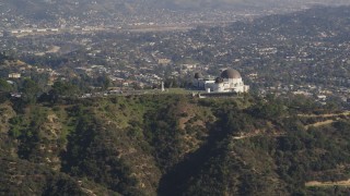 DCLA_108 - 5K aerial stock footage of Griffith Observatory overlooking Los Angeles Basin in California