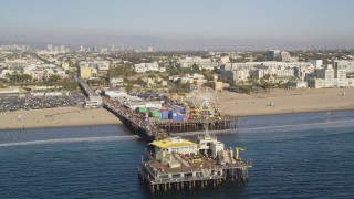 DCLA_126 - 5K aerial stock footage orbit end of Santa Monica Pier with visitors in Los Angeles, California