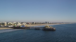 DCLA_129 - 5K aerial stock footage fly low by the end of Santa Monica Pier, California