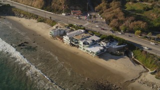 DCLA_161 - 5K aerial stock footage approach beachfront homes and Highway 1 in Malibu, California