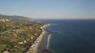 DCLA_167 - 5K aerial stock footage fly over Highway 1 and homes on the beach in Malibu, California