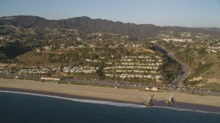 DCLA_178 - 5K aerial stock footage of passing neighborhoods near the beach and Highway 1 in Pacific Palisades, California
