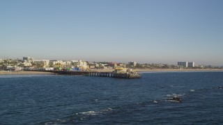 DCLA_180 - 5K aerial stock footage of passing close to Santa Monica Pier and the beach in California