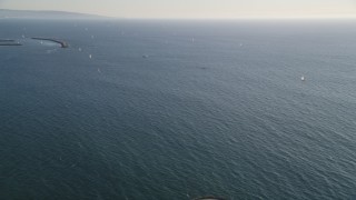 DCLA_185 - 5K aerial stock footage of sailboats seen from Venice Fishing Pier in California