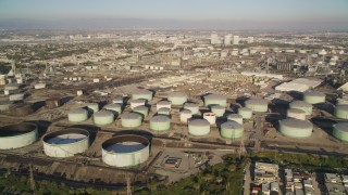DCLA_193 - 5K aerial stock footage of giant tanks at an oil refinery in El Segundo, California