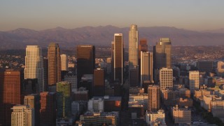 DCLA_211 - 5K aerial stock footage tilt from Hope Street to reveal Downtown Los Angeles high-rises at sunset, California