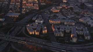 DCLA_215 - 5K stock footage aerial video fly over Downtown Los Angeles concert hall and theater near freeway and apartments at sunset, California