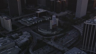 DCLA_218 - 5K aerial stock footage approach Downtown Los Angeles and tilt to reveal Highway 110 at sunset, California
