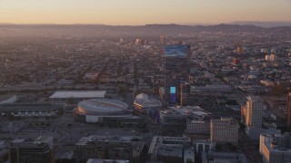 DCLA_223 - 5K aerial stock footage of Staples Center and The Ritz-Carlton in Downtown Los Angeles at sunset, California