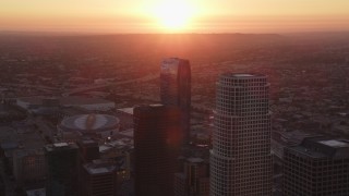 DCLA_235 - 5K aerial stock footage fly between towers to reveal Staples Center and The Ritz-Carlton at sunset in Downtown Los Angeles, California