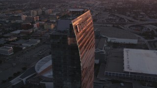 DCLA_236 - 5K aerial stock footage orbit Ritz-Carlton and Staples Center in Downtown Los Angeles at sunset, California