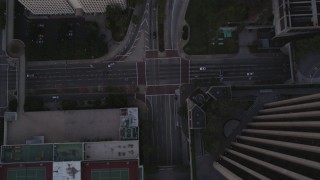 DCLA_250 - 5K aerial stock footage bird's eye of Flower Street in Downtown Los Angeles at twilight, California