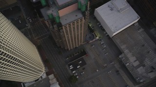 DCLA_262 - 5K aerial stock footage of a bird's eye of city streets and parking lot at twilight in Downtown Los Angeles, California