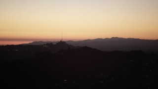 DCLA_285 - 5K aerial stock footage of radio tower in the Hollywood Hills at twilight, California