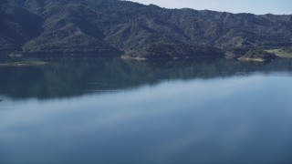 DCSF01_006 - 5K aerial stock footage Flying by the still water of Lake Casitas, Ventura, California