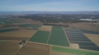 DCSF02_003 - 5K aerial stock footage Flying over geometric farmland, Nipomo, California