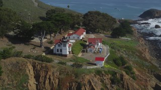 DCSF02_016 - 5K stock footage aerial video Orbit San Luis Obispo Lighthouse on a cliff overlooking the ocean, San Luis Obispo, California