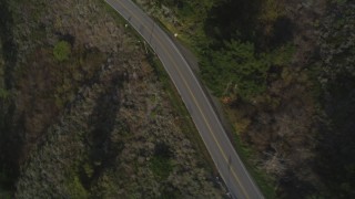 DCSF03_035 - 5K stock footage aerial video Bird's eye view of Highway 1 winding past hills, Big Sur, California