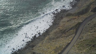DCSF03_036 - 5K aerial stock footage Bird's eye view of ocean waves, reveal Highway 1, Big Sur, California