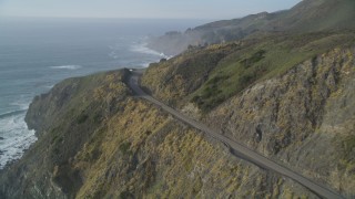 DCSF03_038 - 5K aerial stock footage Approach a bend in Highway 1 in the hills above the coastline, Big Sur, California
