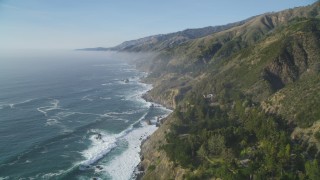 DCSF03_048 - 5K stock footage aerial video Follow the coast and fly over steep cliffs, Big Sur, California