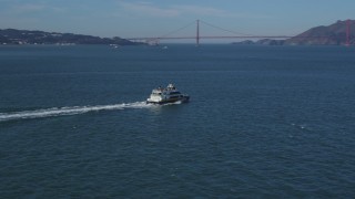 DCSF05_022 - 5K aerial stock footage Track a ferry cruising San Francisco Bay, California