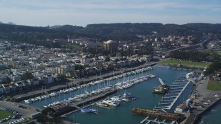 DCSF05_030 - 5K aerial stock footage Tilt from San Francisco Bay to reveal Yacht Harbor and Palace of Fine Arts, San Francisco, California