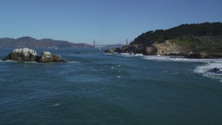 DCSF05_058 - 5K stock footage aerial video Approach Seal Rocks, reveal the Golden Gate Bridge, San Francisco, California