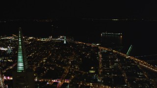 DCSF06_023 - 5K aerial stock footage Flyby Transamerica Pyramid, approach Coit Tower, San Francisco, California, night