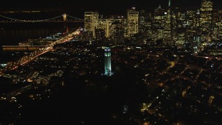DCSF06_024 - 5K aerial stock footage Flyby Coit Tower in North Beach, San Francisco, California, night